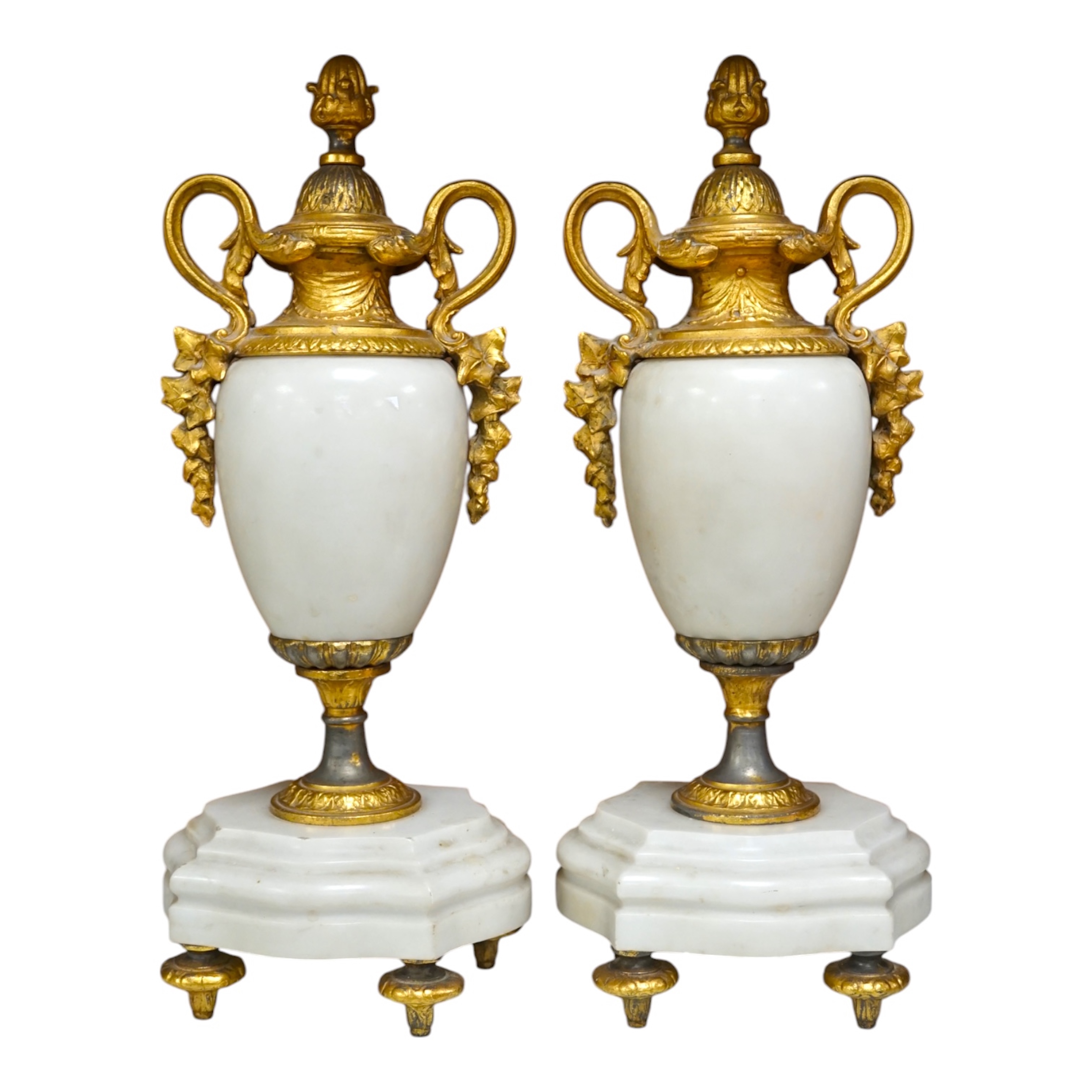 A pair of early 20th century white marble and gilt metal garnitures, 32cm. Condition - worn